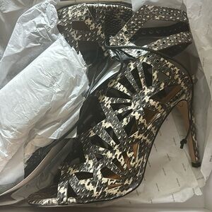 Dolce Vita black and white snake print heels, lace up front feature